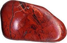 A polished red jasper stone